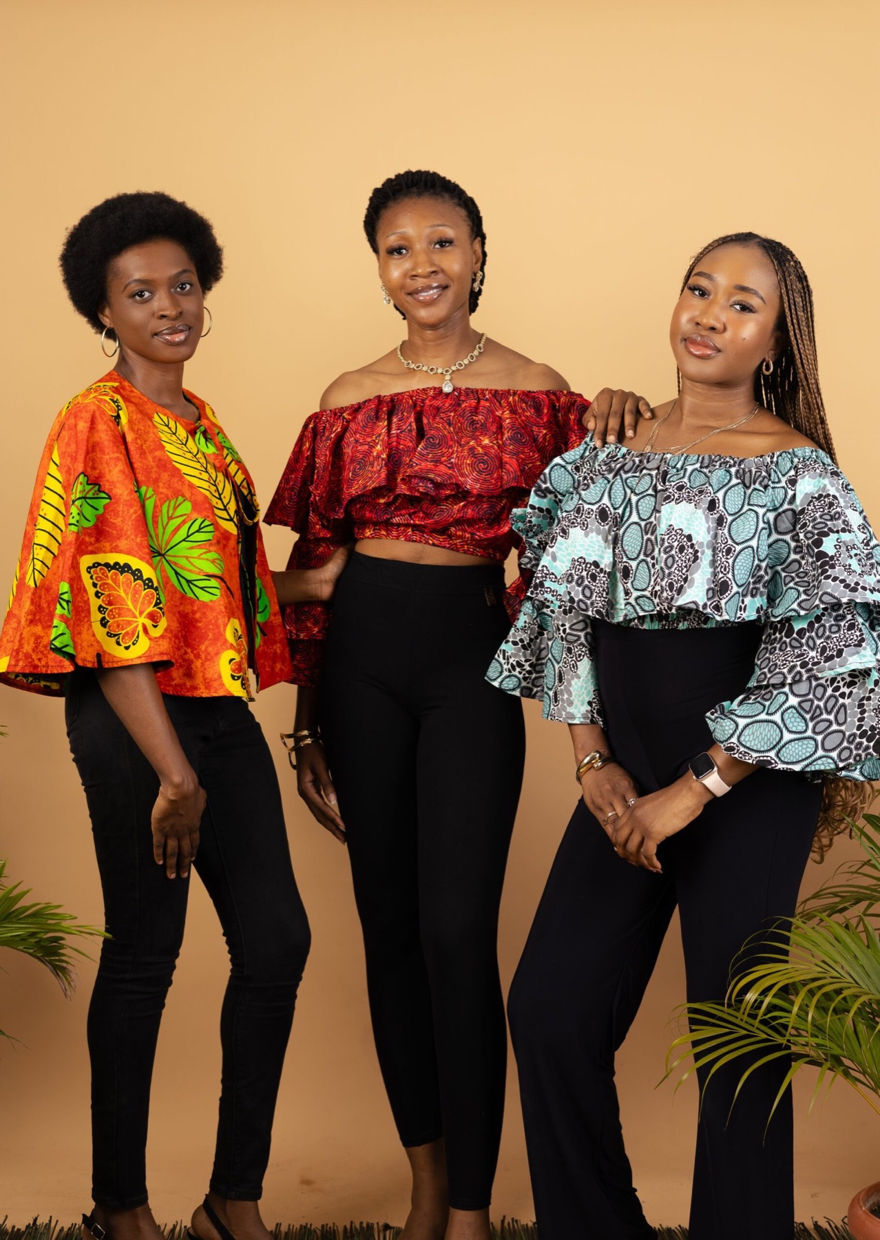 Three women in Fayemz off-shoulder print tops